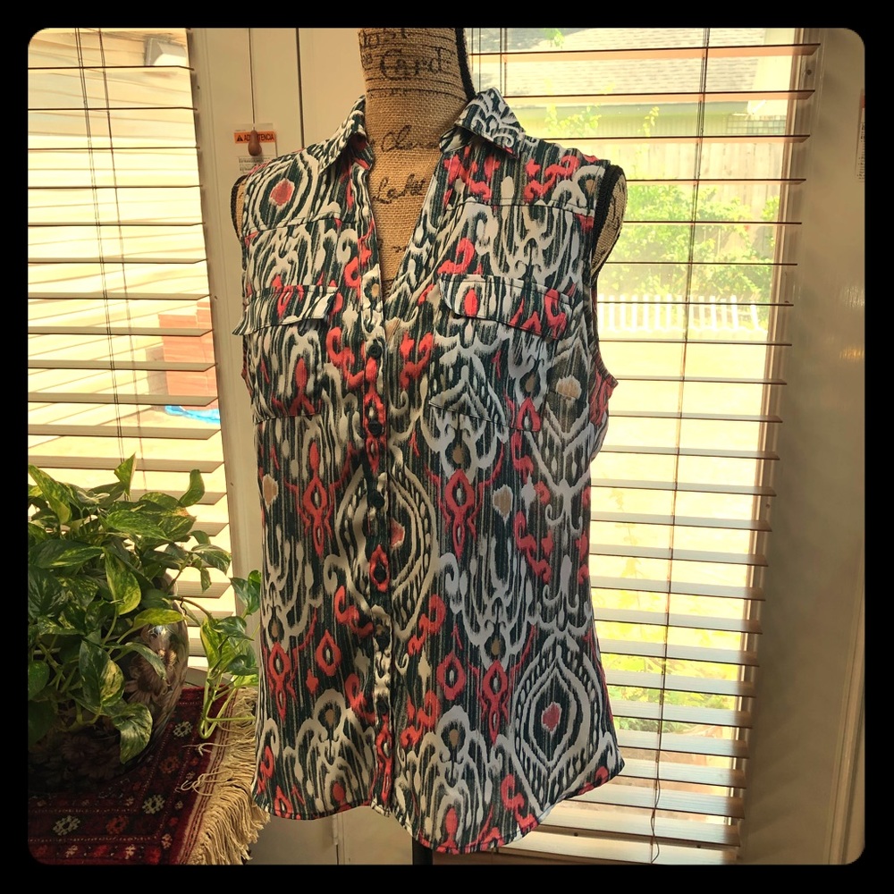 Blouse no sleeves excellent condition worn twice.